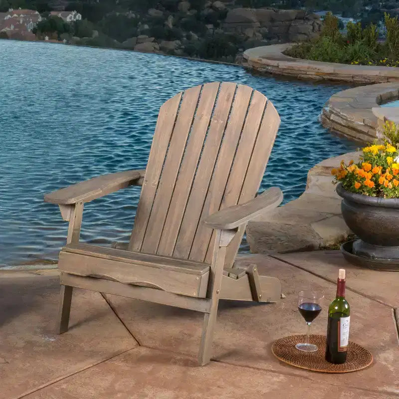 Sedia Adirondack reclinabile da esterno Christopher Knight Home in legno di acacia con poggiapiedi allungabile