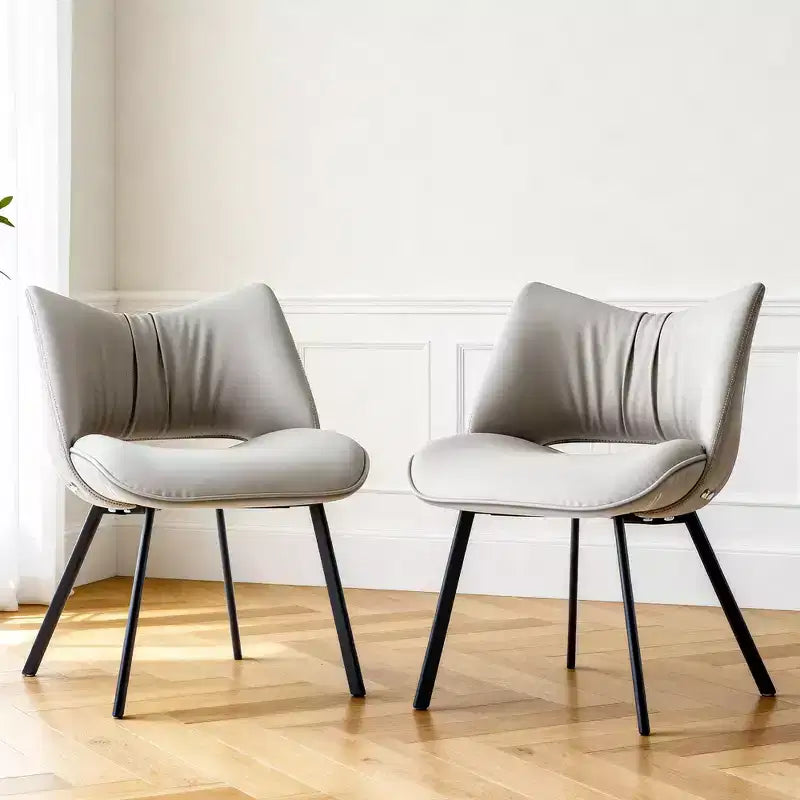 Sedia da pranzo moderna imbottita con schienale curvo e gambe in metallo nero - Grigio chiaro