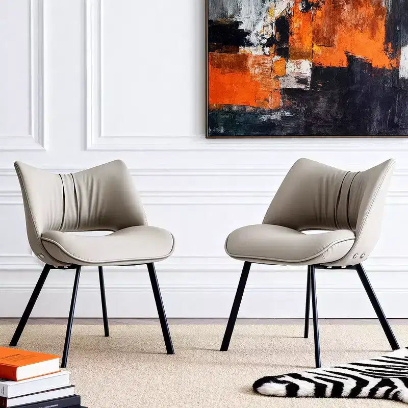 Sedia da pranzo moderna imbottita con schienale curvo e gambe in metallo nero - Grigio chiaro