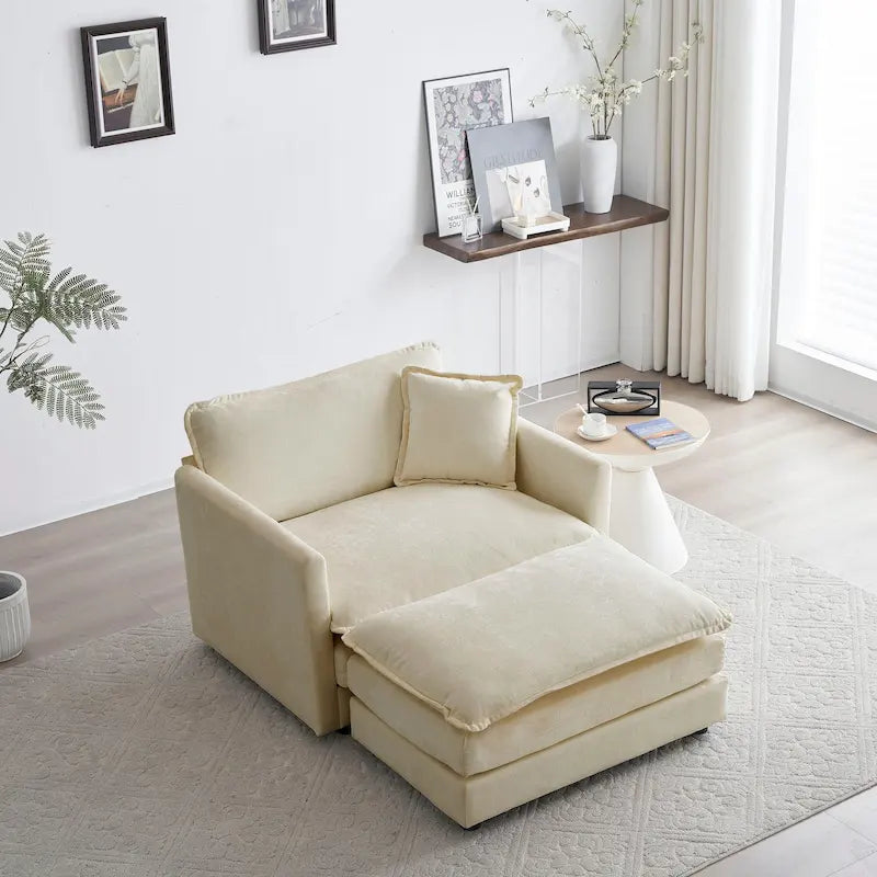 Poltrona moderna con pouf imbottito