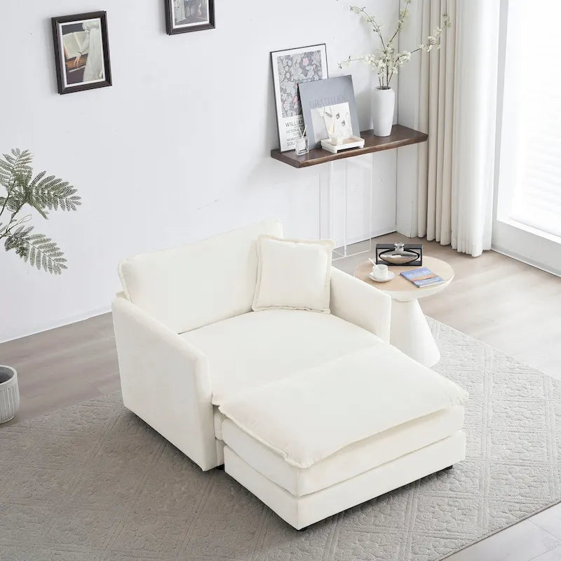 Poltrona moderna con pouf imbottito