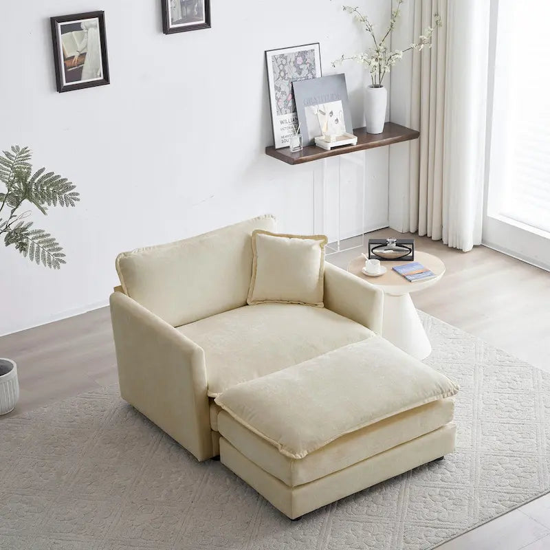 Poltrona moderna con pouf imbottito