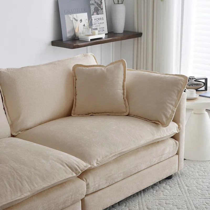 Poltrona moderna con pouf imbottito