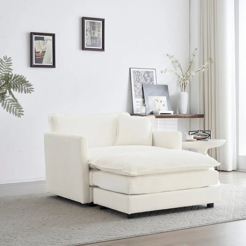 Poltrona moderna con pouf imbottito