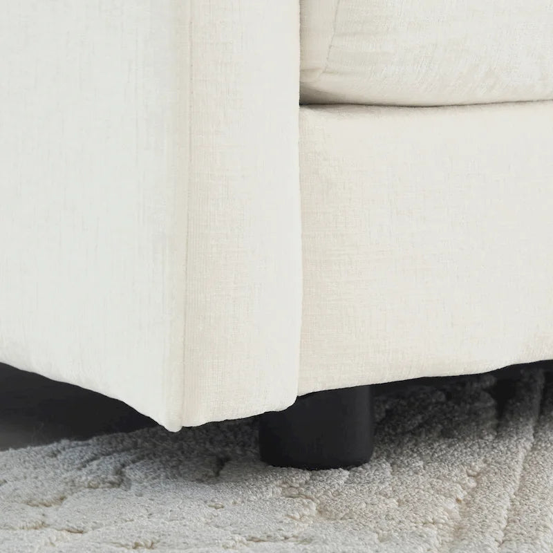 Poltrona moderna con pouf imbottito
