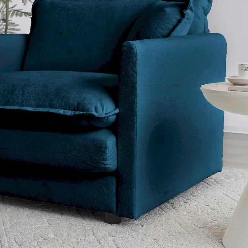 Poltrona moderna con pouf imbottito