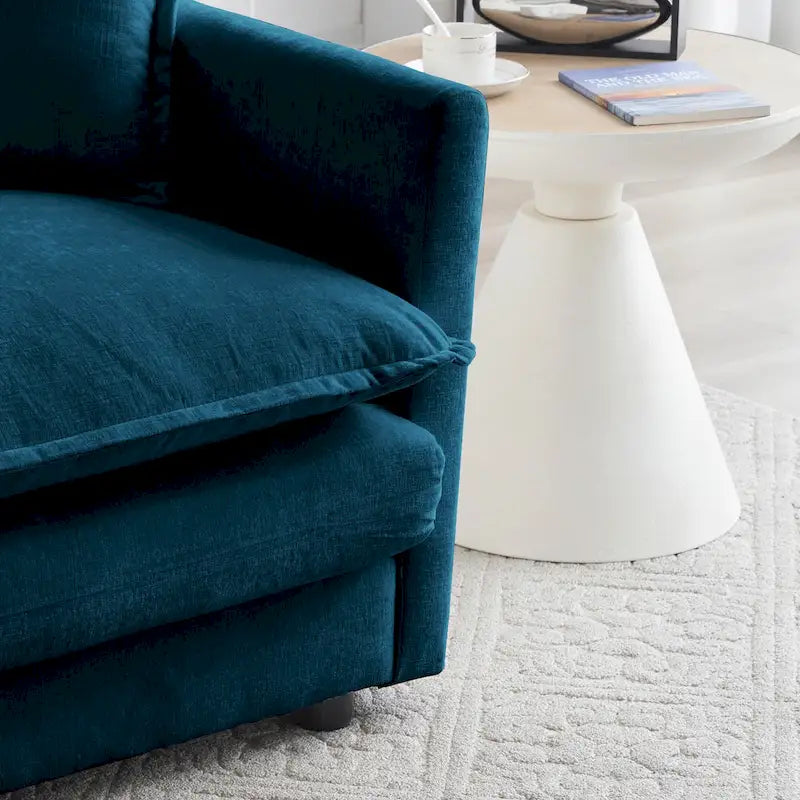 Poltrona moderna con pouf imbottito