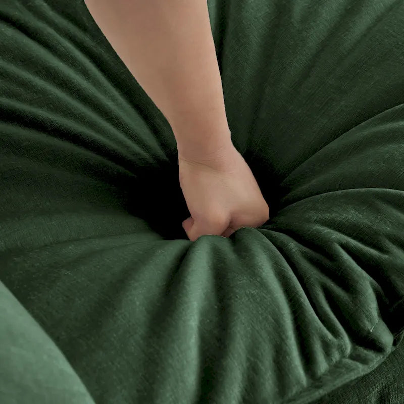 Poltrona moderna con pouf imbottito