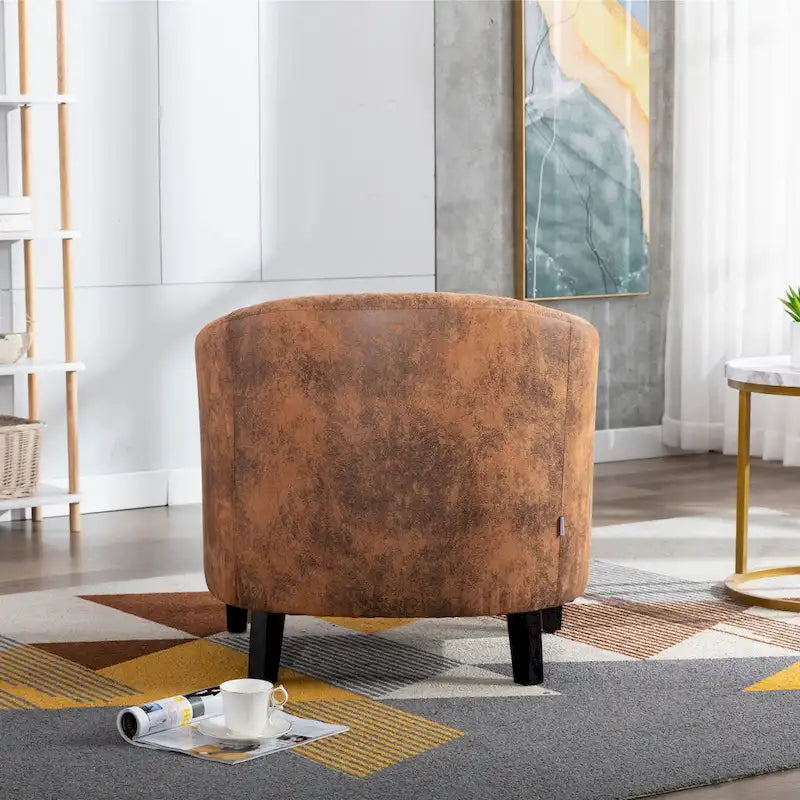 Poltrona a barilotto Accent, sedia da salotto con borchie e gambe in legno massiccio