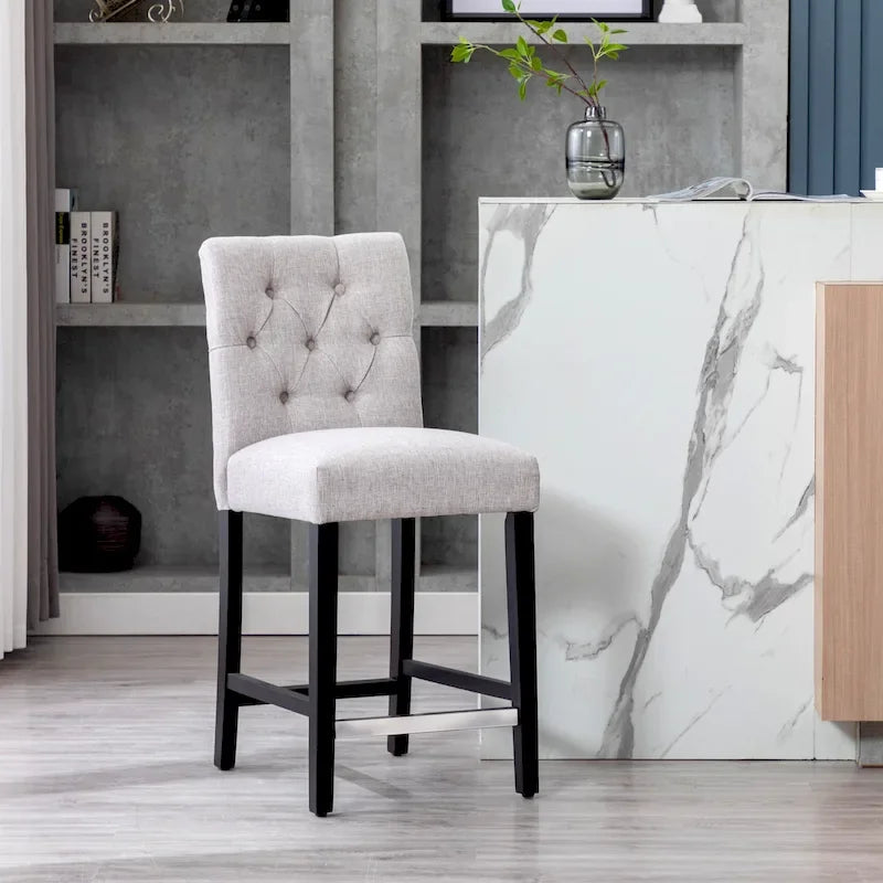 Tabouret de comptoir Carter 24 classique capitonné, pieds finition noire