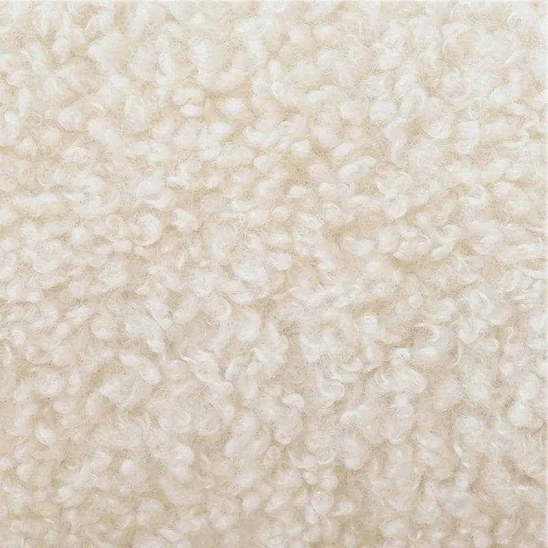 Poltrona imbottita in boucle