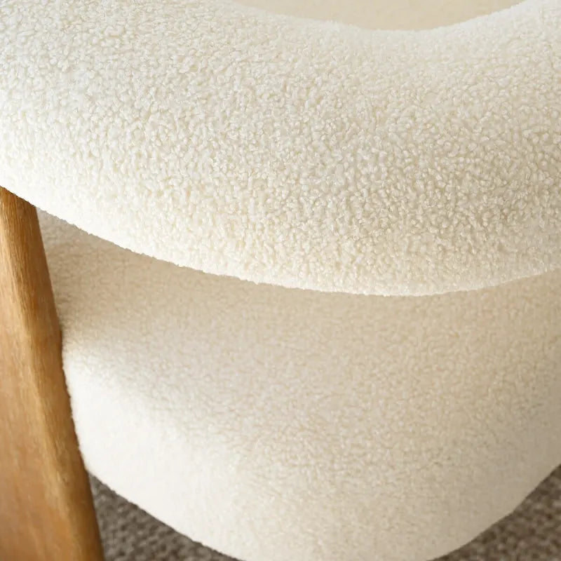Poltrona imbottita in boucle