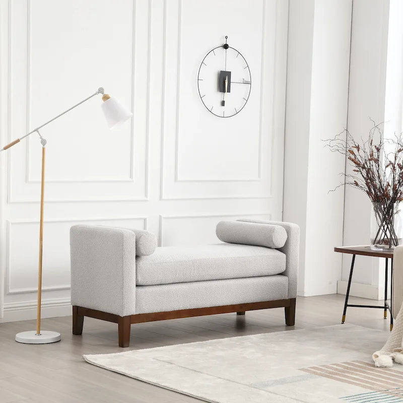 Panca imbottita con gambe in legno