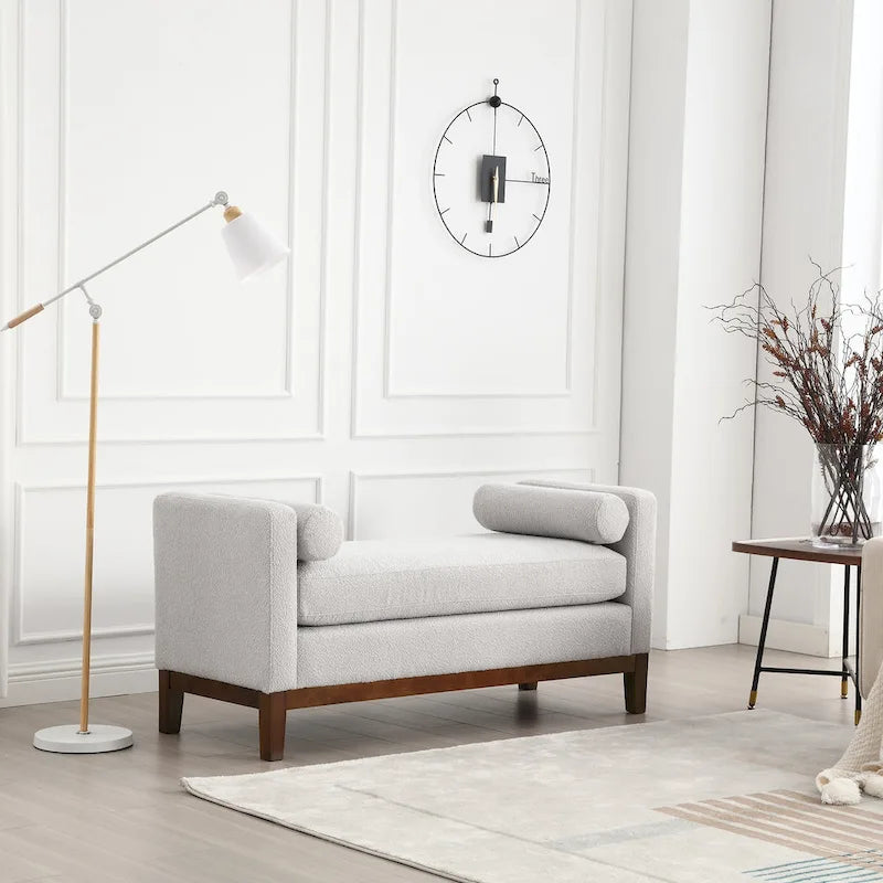 Panca imbottita con gambe in legno