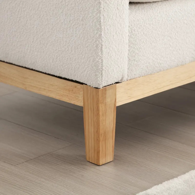 Panca imbottita con gambe in legno