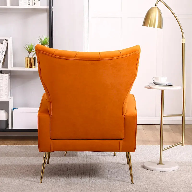 Poltrona a orecchioni imbottita con pouf
