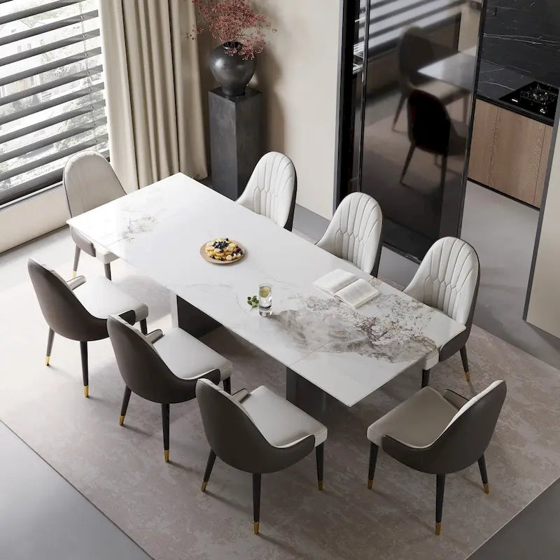 Set da pranzo da 9 pezzi: tavolo allungabile in pietra sinterizzata da 240 cm con 8 sedie