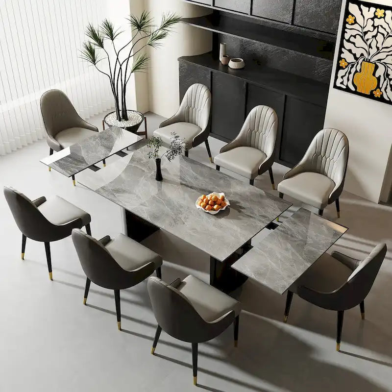 Set da pranzo da 9 pezzi: tavolo allungabile in pietra sinterizzata da 240 cm con 8 sedie