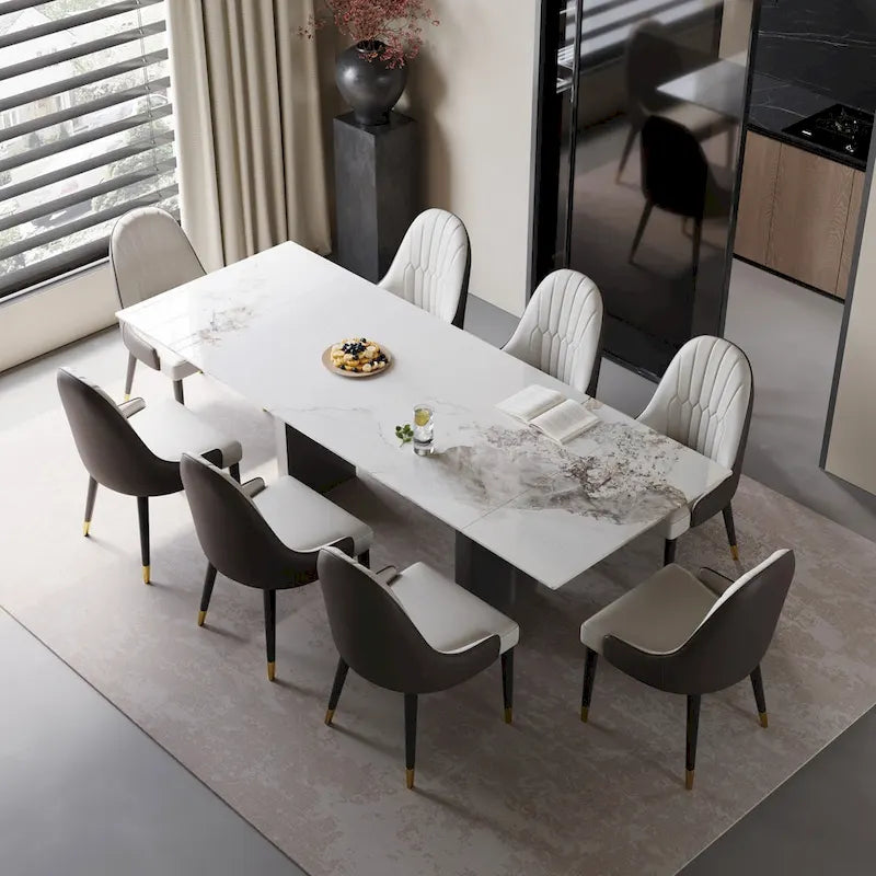 Set da pranzo da 9 pezzi: tavolo allungabile in pietra sinterizzata da 240 cm con 8 sedie